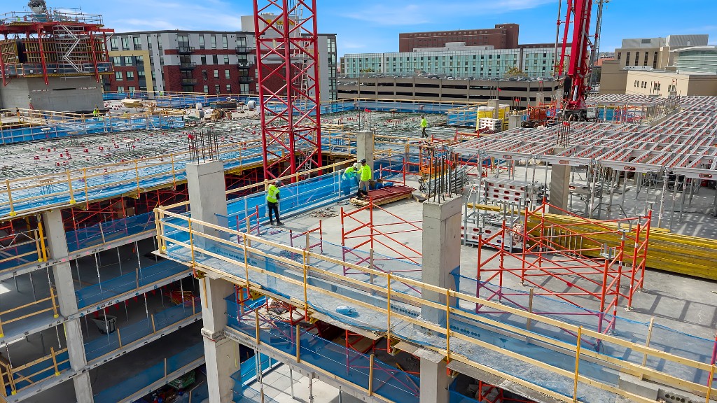 Workers on elevated concrete deck