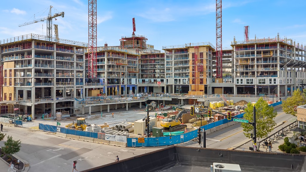 Construction site with cranes and active work