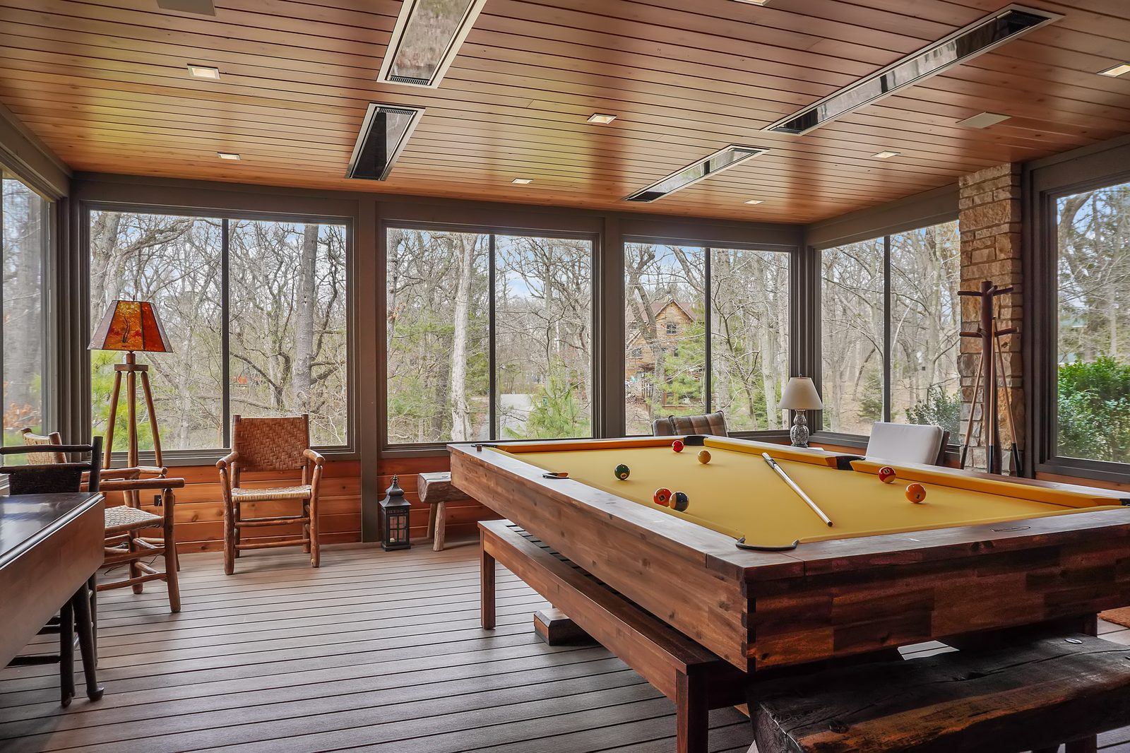 Screened porch with pool table