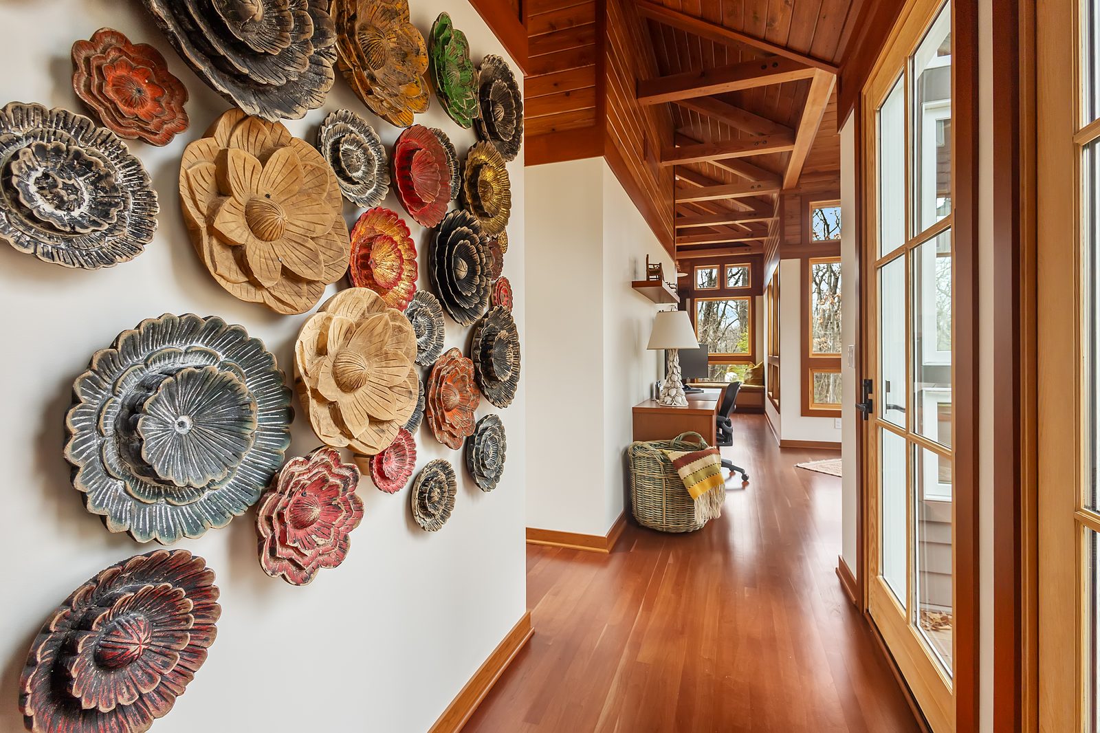 Hallway with decorative wall art