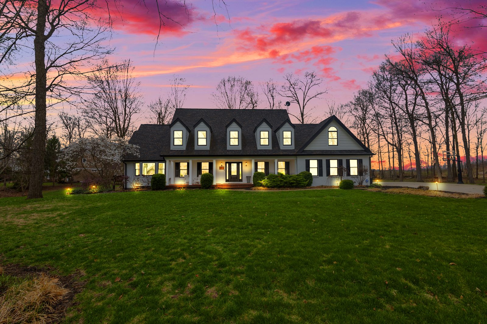 Twilight exterior with glowing windows