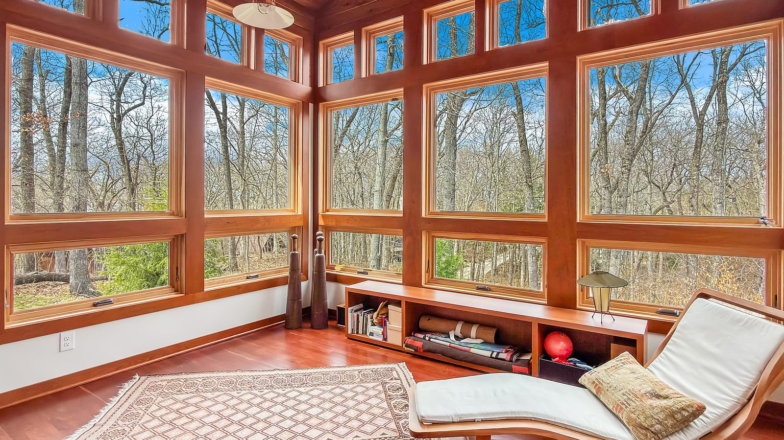 Sunroom reading nook with windows