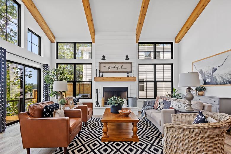 Interior photo — vaulted living room with exposed beams